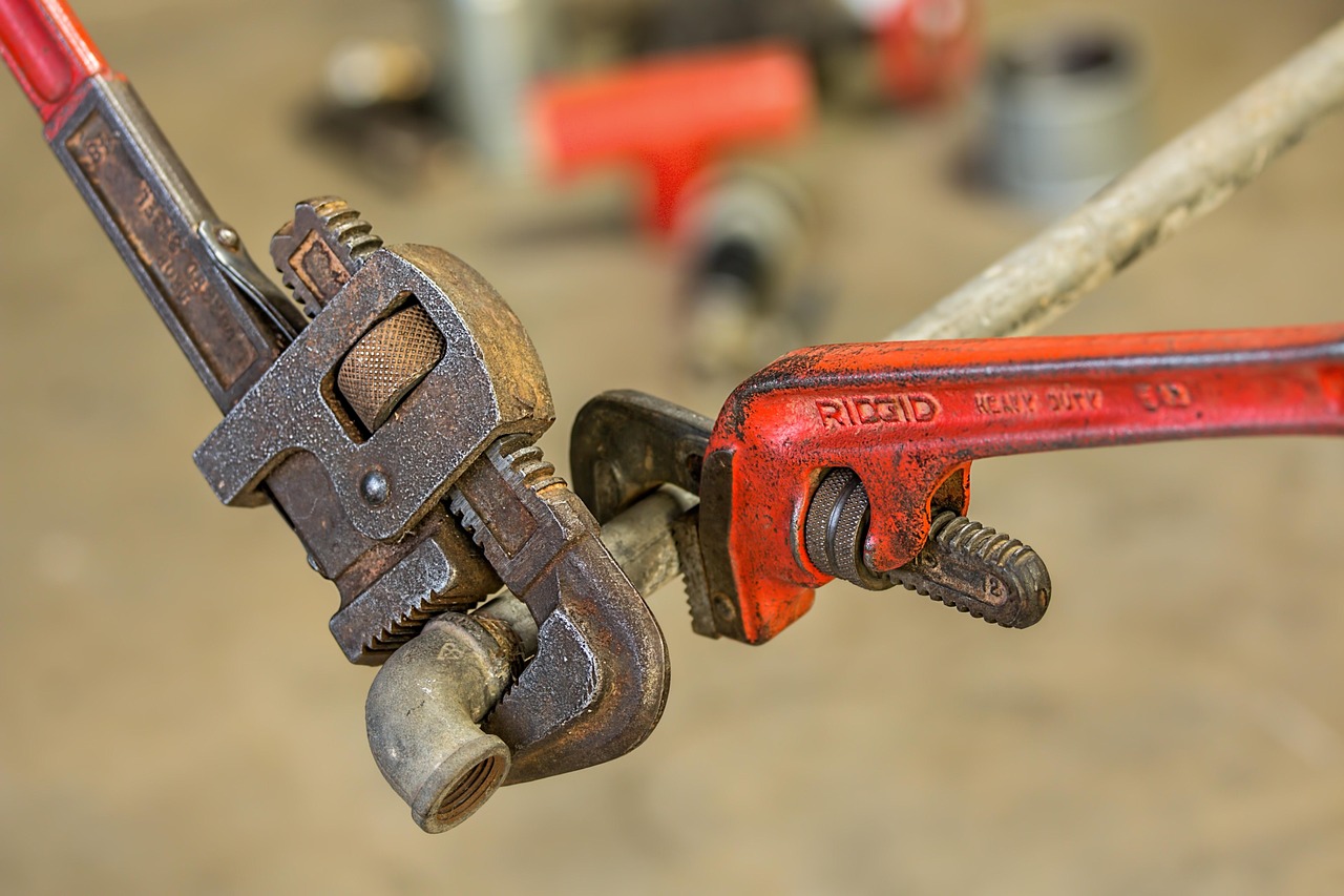 Plumbing, pipe wrench, repair — Why Emergency Tree Removal Service in RI Is Essential for Property Safety